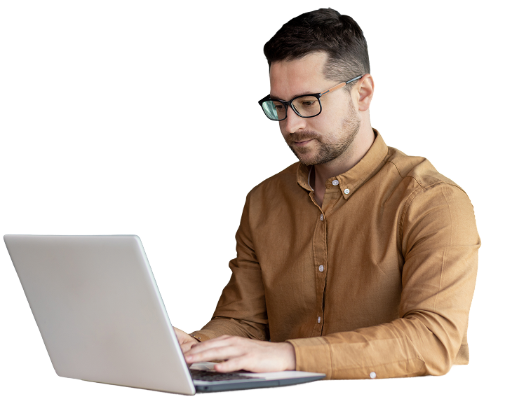 Man at laptop assessing talent